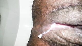 Closeup of hairy creamy pussy and pooping asshole