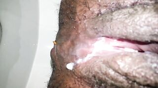 Closeup of hairy creamy pussy and pooping asshole