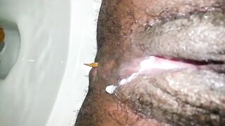 Closeup of hairy creamy pussy and pooping asshole