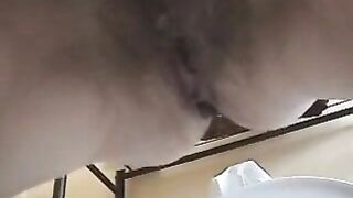 Lovely hairy pussy lady pissing and pooping