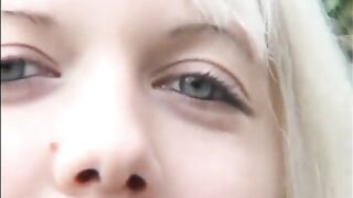 Naughty blonde lady pissing heavily on the rock