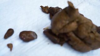 Cute Asian babe poops in the locker room