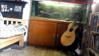 Babe pooping in front of her aquarium