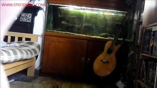 Babe pooping in front of her aquarium