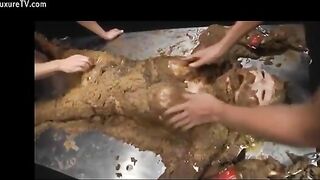 Naughty busty Asian covered heavily in wet shit