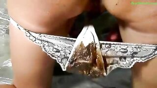 Smearing poop in her panties and eating it