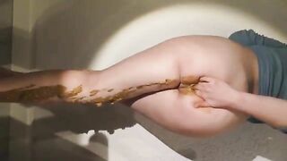Smearing shit on her sexy ass