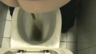 Cute amateur lady poops heavily in the toilet