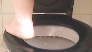 Big clit lady pissing and pooping in toilet