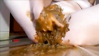 Woman pisses on the floor and makes a mess with her feet