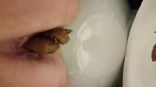 Closeup hot lady pooping