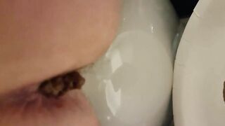 Closeup hot lady pooping