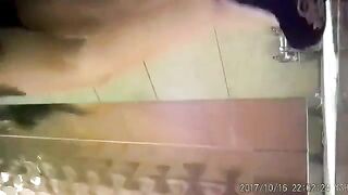 Mature lady pooping in public toilet