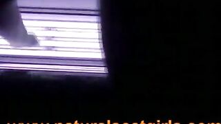 Woman shits in sun studio