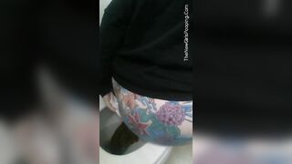 Tattooed pooping babe