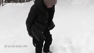 Pooping on slave in the snow