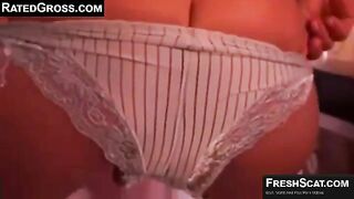 Lady poops nicely in her panties