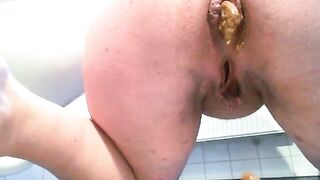 Mature woman shitting  closeup