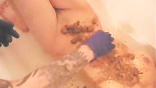 Smearing shit on her sexy body