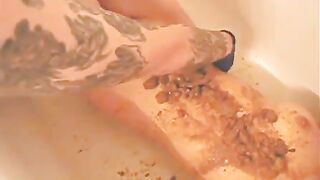 Smearing shit on her sexy body