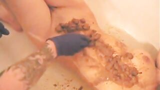 Smearing shit on her sexy body