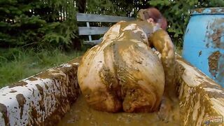 Lyndra Lynn playing in cowshit