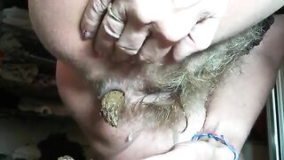 Hairy lady pooping in her hand