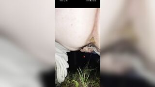 Outside poop in the grass