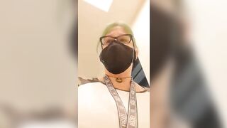 Woman takes a huge shit on a plastic sheet