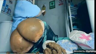 She shits on the floor and rubs it all over her legs