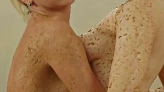 Kinky lesbians kissing and licking while smearing with horse shit