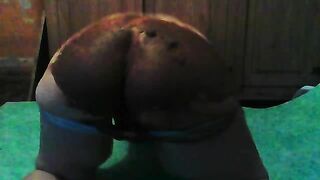 Smearing ass with dark shit