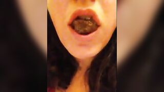 Happy brunette eats big turd