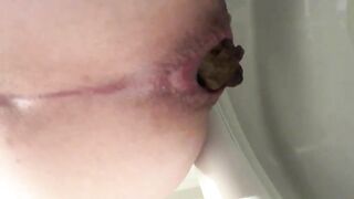 Pushing small hard turd