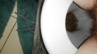 Hairy bitch pooping and pissing