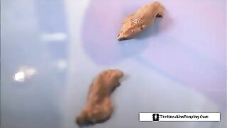 Cute blonde teen chick pooping on the table