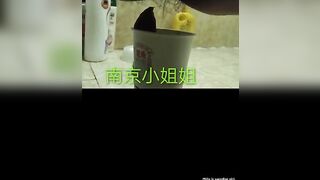 Chinese girl poops in paper cup