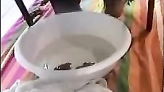 Big black booty ebony lady poop closeup