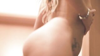 Slim blonde bends over for poop