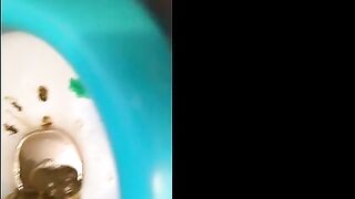 Nerdy blonde in glasses pooping heavily