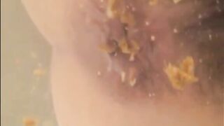 Woman shitting in the bathtub