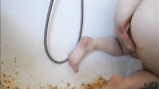Young girl shitting liquid diarrhea in the bathtub