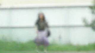 Married lady poops in the grass