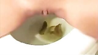 Sweet juicy ass girl pooping in the toilet