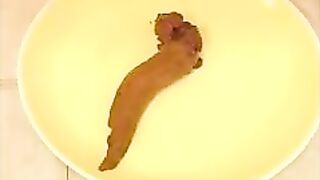 Sweet looking brunette babe and sexy turd