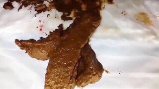 Slut smearing shit on her pussy