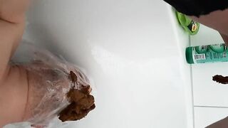 Hairy pussy lady poops on her slave