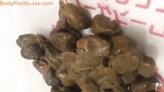 Lovely Asian babe poops on the floor