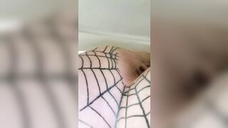 Girl spreads her ass in a fishnet stocking