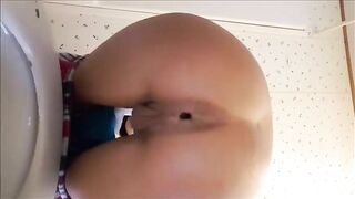 Petite babe shitting a huge turd